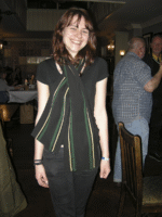 2013 Melange Rose and Crown Ealing: One of the attractive Rose & Crown bar staff modelling a genuine original Ealing Mead school scarf. Photo: Keith Littlejohns