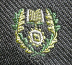 Ken Hattersley’s Ealing Mead County School tie (close up of school emblem). Photo Keith Littlejohns.