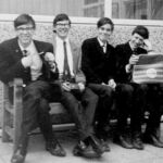 Photo c1968 Leslie Cooper seated left pointing to his Crompton house prefect badge, Colin Hawkett on extreme right. Photo supplied by Leslie Cooper.