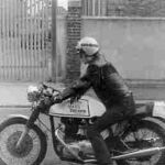 Neil Murray 1952 - 2009. Neil Murray 1970 and his motorcycle. Classics of their era. Muzz on his 650 cc Norton-Triumph set against the industrial retro-chic of the Almond Avenue power station.